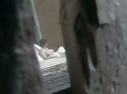 Peeping on my topless neighbour