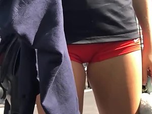 Fit ass and hot pussy bulge in red shorts