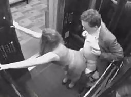 Fuck in the elevator on a security cam