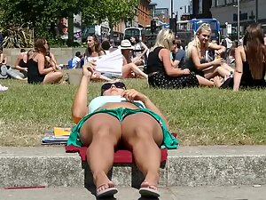 Peeping on her sexy legs and big boobs in park