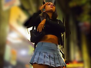 Upskirt of provocative girl in front of nightclub