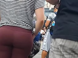 Big butt in dark purple tights