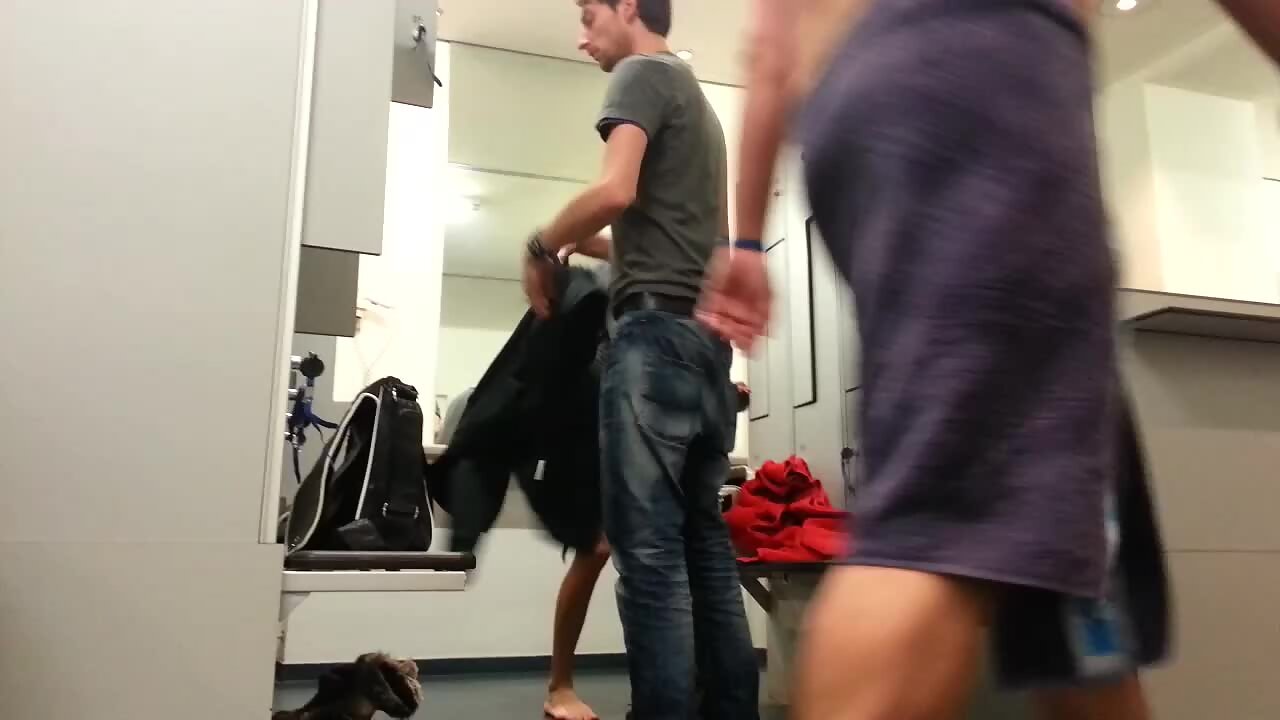 Hot blonde undresses in an unisex locker room - Voyeurs HD 