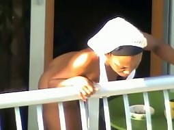 She got no panties on the balcony