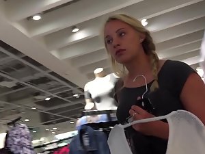 Voyeur follows sexy shopper in cutoff shorts