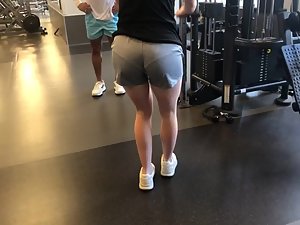 Visible panties on perky butt in the gym