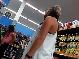Sexy alternative babe in the store
