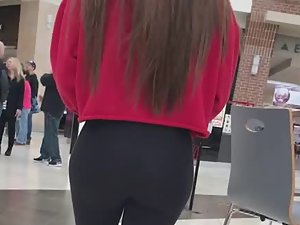 Perfect teen girl walks through mall