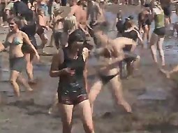 Teens having fun in the mud