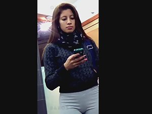 Latina's pussy bulge in grey tights