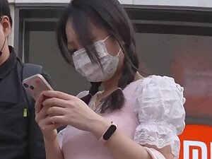 Upskirt of adorable asian girl shows panties tucked in her ass crack