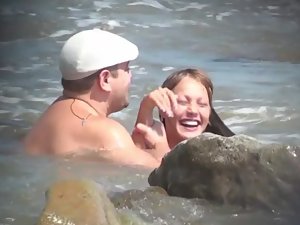 Naked beauty swims with fat boyfriend