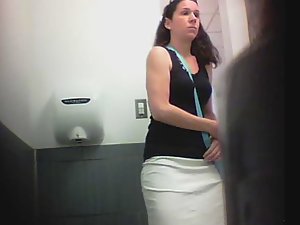 Peeping a tight pussy in public toilet
