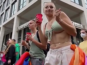 Enjoying blonde's yummy boobs during the parade