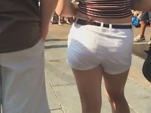 Cute teen girl in tight white shorts