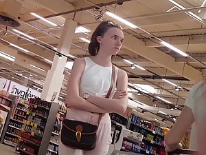 Fancy slim teen followed around the supermarket