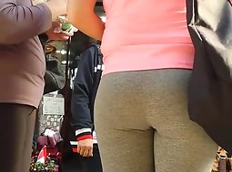 Splendid round ass in grey tights