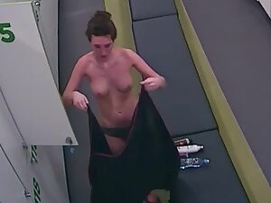 Hidden cam caught skinny woman's fake tits in the locker room