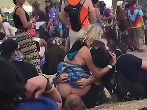 Ass eating in front of everybody at a festival