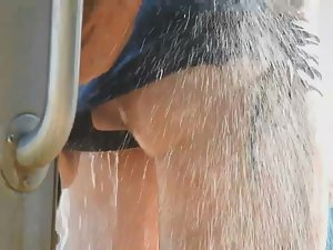 Hot sweaty ass gets washed outside